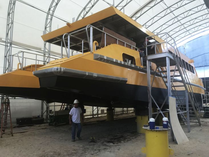 Now painted in its distinctive Taxi Yellow color, Potomac Taxi 1 is being prepared for launch.