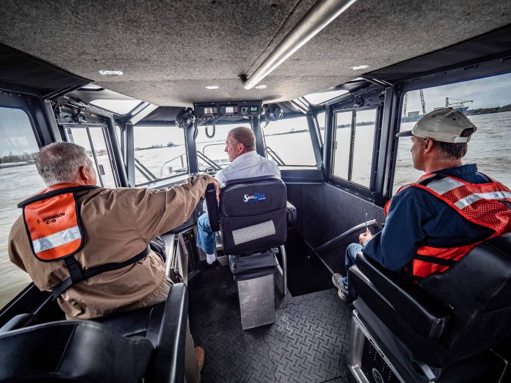 LtoR: Cresent River Pilot, Capt. Chris Johnson, BCMT Port Capt. Royce Hammer and BCMT Capt. Scotty Assavedo in the pilot house of Jet 1. Jet 1, a new addiction, along with Jet 2, to the Belle Chasse Marine Transportation fleet in New Orleans, performing on the Mississippi River. Jet 1 is a a Defiant class pilot boat, designed and built by Metal Shark
Builder: Metal Shark
Designer: Metal Shark
Owner: Belle Chasse Marine Transport, LLC
Mission: Deliver/Retrieve Gear and Personnel from Commercial Vessels
Length: 45’ 2” Beam: 12’ 9”
Depth (Molded): 6’ 10”Draft: 2’ 6”
Deadweight Tonnage (OSVs): N/A
Main Propulsion (Mfer., Model, HP@RPM): Cummins, QSM11-610 INT, 602bhp @ 2300rpm
Bollard Pull (tugs): N/A
Z-Drive: N/A
Rear Cargo Deck (dimensions): 11’ Long X 12’ Wide
Ship’s Service Power (Mfer., Model): Cummins, Onan MDKDL 9kW
Marine Gear (Mfer., Model, Reduction Ratio): Twin Disc, MG5114SC, 1.02:1
Propellers/Jets (Mfer., Dia., Pitch, Material, No. of Blades): Hamilton, HJ322
Controls (Mfer., Model): Livorsi, STEM22BK, Electronic
Thrusters/Thruster Engines: N/A
Steering System (Mfer., Model): Sea Star Components
Speed (Knots): 29 (cruise), 35+ (top)
Hull Construction: Aluminum
Cargo Deck: N/A
Crew Capacity/Passenger Capacity: Seating for 11
Capacities (Fuel, water, lube, dry bulk materials, liquid mud etc.): 500gal Diesel, 20gal Freshwater, 20gal Blackwater
Electronics (Mfer. Model): Furuno TZTouch2 12” MFD, Furuno DRS4DNXT Radar, Furuno FA-170 AIS, Twin ICOM M506 VHF Radios, Fusion MS-RA70NSX Audio Package, LED Stryker Spotlight, (6) Hella Sea Hawk XLR Floodlights
Important Ancillary Equipment/Systems: (3) 16,000BTU Cruisair AC Units, Dometic 2.3CF AC/DC Refrigerator, GE 700W 0.7CF Microwave
Classification/Certification: N/A
Delivery Date: 9/20/2019